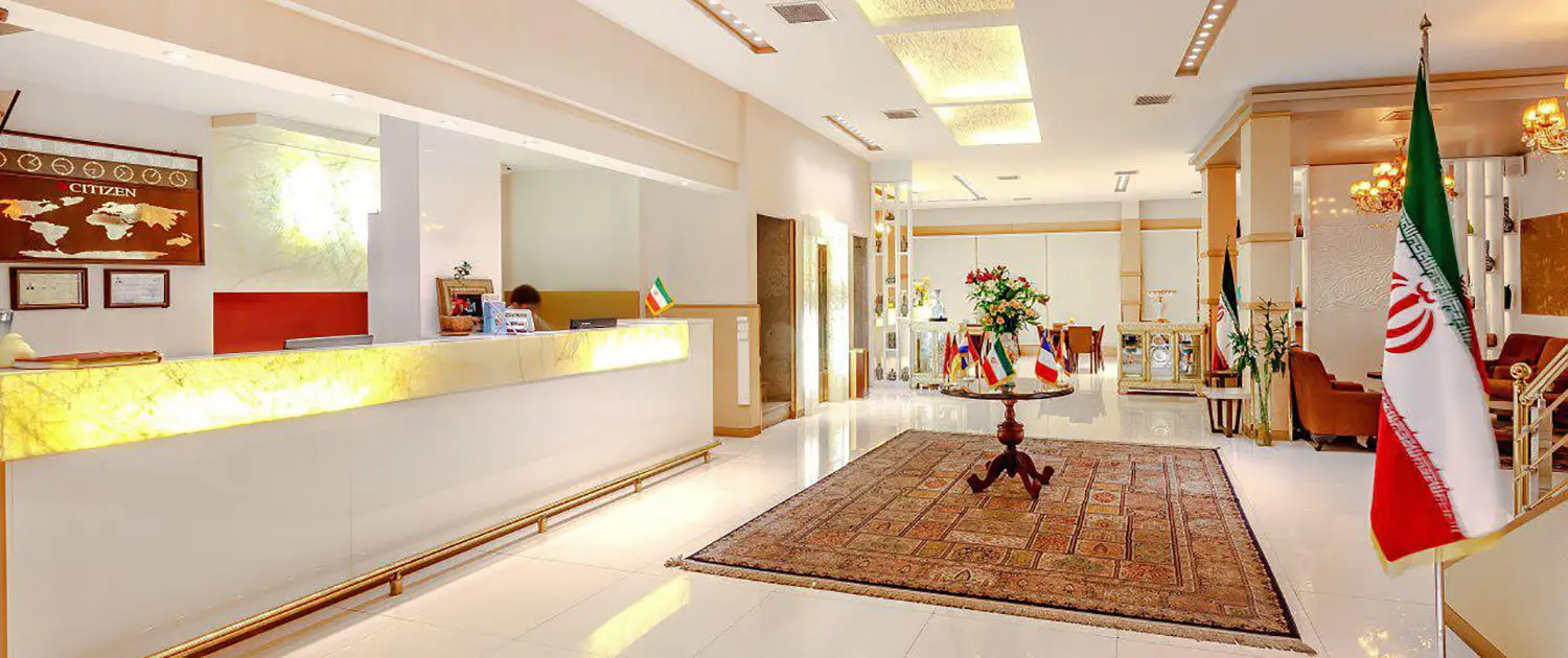 Spacious deluxe room at Pamchal Hotel with modern amenities for patient recovery
